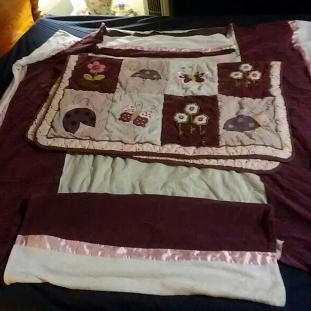 Crib skirt and a baby blanket